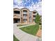 Inviting condo complex with well-maintained landscaping and private balconies at 7440 S Blackhawk St # 12-204, Englewood, CO 80112