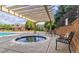 Community hot tub and seating area next to the pool at 7440 S Blackhawk St # 12-204, Englewood, CO 80112