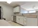 Functional kitchen with stainless steel appliances, plenty of cabinets, and a view at 7440 S Blackhawk St # 12-204, Englewood, CO 80112