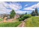 Community playground with surrounding townhomes and green space at 7440 S Blackhawk St # 12-204, Englewood, CO 80112