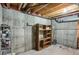 Unfinished basement with concrete walls and floors, ideal for storage or future expansion at 162 Blue Spruce Ct, Highlands Ranch, CO 80126