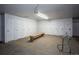 Storage area with long, neutral bench and row of numbered storage units at 305 S Park Ave # 205, Breckenridge, CO 80424