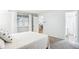 Bright bedroom with a closet and an ensuite bathroom at 14121 E Baltic Pl, Aurora, CO 80014