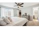 Bedroom featuring a view of the ensuite bathroom and closet at 14121 E Baltic Pl, Aurora, CO 80014