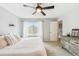 Bedroom with large window and view of the exterior and neutral walls at 14121 E Baltic Pl, Aurora, CO 80014