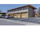 Exterior view of garages with parking spaces in front of each at 1105 Bacchus Dr # F8, Lafayette, CO 80026