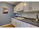 Well-lit kitchen offering bright white cabinetry and dark countertops, great for cooking at 1105 Bacchus Dr # F8, Lafayette, CO 80026