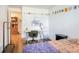 Cozy bedroom featuring a workstation with a desk and a rolling storage cart, offering a practical living space at 1842 Canyon Blvd # 105, Boulder, CO 80302