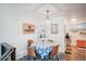 Charming dining area with a round table, seating for four, and natural light at 1842 Canyon Blvd # 105, Boulder, CO 80302