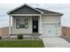 Charming single-Gathering home featuring a one-car garage and a well-maintained front yard at 944 Savona Ave, Fort Lupton, CO 80621