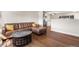 Cozy living room boasts hardwood floors, a comfortable sofa, and an inviting atmosphere at 3395 W Union Ave, Englewood, CO 80110