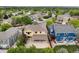 Aerial view showcasing the home, backyard, and surrounding neighborhood at 13262 Elizabeth St, Thornton, CO 80241