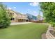 Expansive backyard with artificial grass, perfect for outdoor activities and relaxation at 13262 Elizabeth St, Thornton, CO 80241