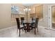 Cozy dining area with natural light, perfect for Gathering meals and entertaining at 13262 Elizabeth St, Thornton, CO 80241