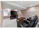 The living room has theatre-style seating and a media center at 13262 Elizabeth St, Thornton, CO 80241