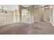 Spacious loft overlooking the living room with neutral colors and natural light at 13262 Elizabeth St, Thornton, CO 80241