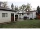 Backyard showing outdoor seating on concrete patio at 2356 S Franklin St, Denver, CO 80210