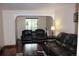 Comfortable living room with arched entryway and neutral paint at 2356 S Franklin St, Denver, CO 80210