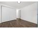 Living room featuring hardwood floors and a closet at 5193 Zinnia St, Arvada, CO 80002