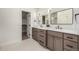 Beautiful bathroom with dual sink vanity, white counters, and modern fixtures at 5401 E Dakota Ave # 22, Denver, CO 80246