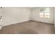 Bright bedroom with hardwood floors, natural light from window, and modern finishes at 5401 E Dakota Ave # 22, Denver, CO 80246
