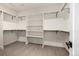 Spacious walk-in closet with ample shelving and rod space for organization at 5401 E Dakota Ave # 22, Denver, CO 80246
