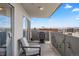 Balcony featuring a city view and comfortable seating area at 909 N Logan St # 11A, Denver, CO 80203
