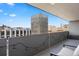 Cozy balcony with string lights and furniture offers cityscape views at 909 N Logan St # 11A, Denver, CO 80203