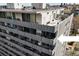 The condo building has multiple balconies on each floor at 909 N Logan St # 11A, Denver, CO 80203