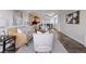 Open living space with combined living, dining, and kitchen areas, modern decor and plenty of natural light at 909 N Logan St # 11A, Denver, CO 80203