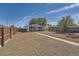 Backyard view of house with pathway at 1289 Newark St, Aurora, CO 80010