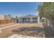 Large backyard with screened porch and fence at 1289 Newark St, Aurora, CO 80010