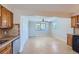 Kitchen with tiled floor and wood cabinets at 1289 Newark St, Aurora, CO 80010