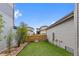 Cozy backyard with low-maintenance turf and a charming play tent at 9624 Dunning Cir, Highlands Ranch, CO 80126