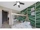 bedroom with themed wall decor and a bed with a wooden canopy at 9624 Dunning Cir, Highlands Ranch, CO 80126
