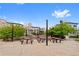 Picnic tables with seating area in front of modern homes at 9624 Dunning Cir, Highlands Ranch, CO 80126