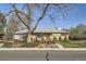 Charming brick home with well-maintained front yard and mature landscaping, plus an attached one car garage at 2070 Kingston St, Aurora, CO 80010