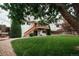 Expansive backyard with a lush green lawn, a wooden deck and staircase, ideal for Gathering gatherings and relaxation at 17530 E Caspian Pl, Aurora, CO 80013
