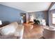 Inviting living room features hardwood floors, and neutral paint at 17530 E Caspian Pl, Aurora, CO 80013