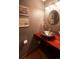 Stylish powder room with a unique vessel sink and modern fixtures at 17530 E Caspian Pl, Aurora, CO 80013