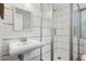 Bathroom featuring a tiled walk-in shower at 2999 Olympia Cir, Evergreen, CO 80439