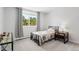 Bright bedroom with large window and view of the trees and landscape at 2999 Olympia Cir, Evergreen, CO 80439