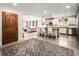 Spacious kitchen with a large island, modern appliances, and hardwood floors at 12941 W 75Th Ave, Arvada, CO 80005
