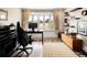 Bright office space features a large bay window, desk, and shelving for a productive work environment at 12941 W 75Th Ave, Arvada, CO 80005