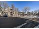 View of condo complex parking lot at 4896 S Dudley St # 5-5, Littleton, CO 80123