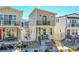 Charming two-story home featuring a balcony and a cozy front porch with seating area at 18284 E 49Th Pl, Denver, CO 80249