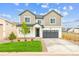 Charming two-story home with landscaped yard, covered porch, and spacious two car garage at 39181 Anthony St, Elizabeth, CO 80107