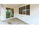 Covered patio featuring an outdoor living space and sliding glass door to the house at 39181 Anthony St, Elizabeth, CO 80107