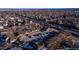 Aerial view shows the townhouse complex close to the highway and neighborhood at 4665 W 6Th Ave # 21, Denver, CO 80204