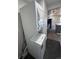 Efficient stacked washer and dryer units make laundry convenient in this home at 4665 W 6Th Ave # 21, Denver, CO 80204